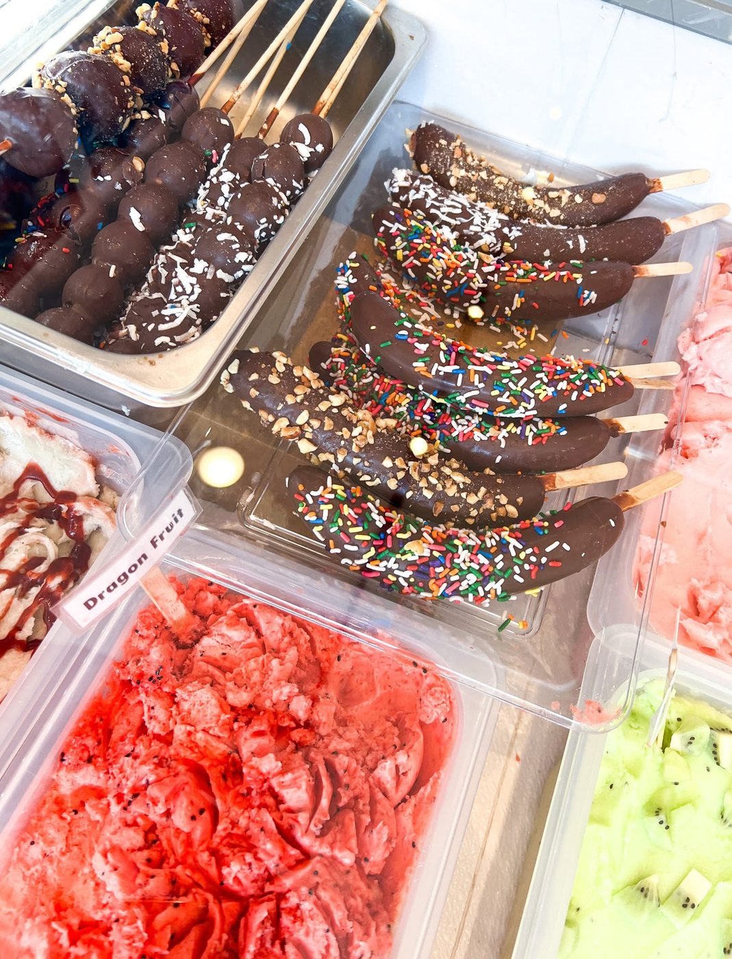 Chocolate-dipped fruit at The Bee Ice Cream case