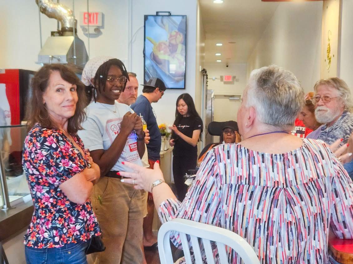 Guests at the counter inside The Bee Ice Cream